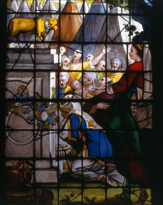 A stained glass window depicting Bible scenes at St Michael's Church. The window came from the Duke of Chandos' Canons estate in Edgware. Photograph: Paul Barker/Country Life