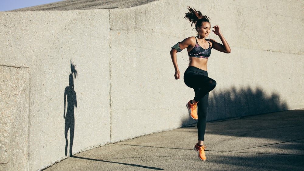 a photo of a woman jumping 