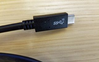 This cable is labeled as 10 Gbps, a clear sign it won't work with a Pi 4