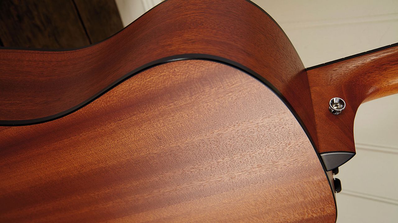 The 150e has layered sapele back and sides and a more functional overall appearance