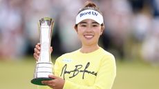 Miyu Yamashita poses with the AIG Women's Open trophy after her victory at Royal Porthcawl in 2025