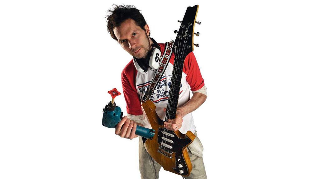 Guitar setup how to use a cordless power drill on a guitar MusicRadar