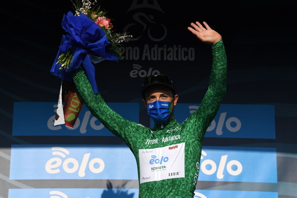 LIDO DI CAMAIORE ITALY MARCH 10 Podium Vincenzo Albanese of Italy and EoloKometa Cycling Team Green Mountain Jersey Celebration during the 56th TirrenoAdriatico 2021 Stage 1 a 156km stage from Lido di Camaiore to Lido di Camaiore Mask Covid Safety Measures TirrenoAdriatico on March 10 2021 in Lido di Camaiore Italy Photo by Tim de WaeleGetty Images