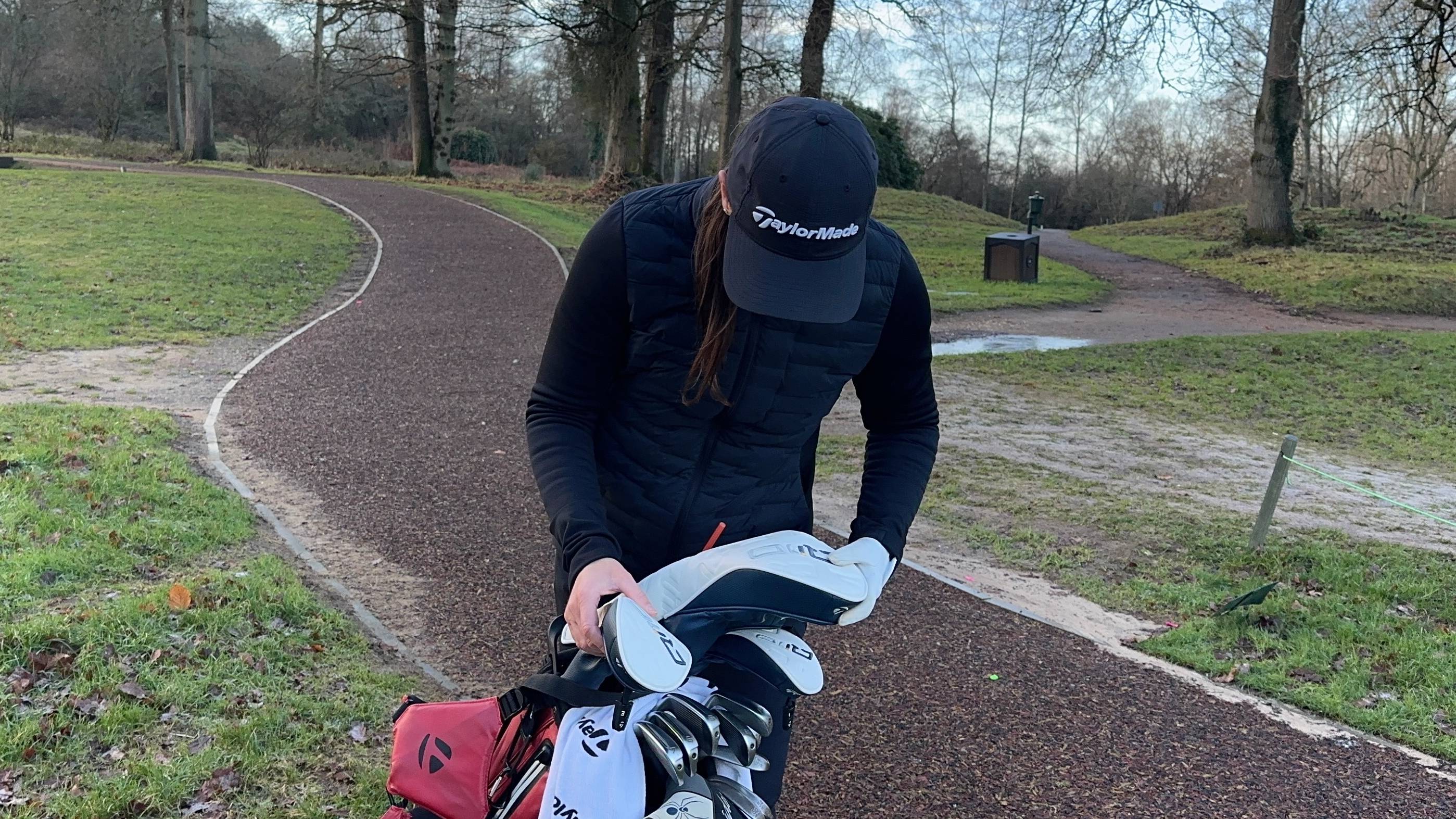 Jess Ratcliffe picking a club