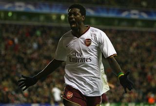 Emmanuel Adebayor of Arsenal celebrates scoring his team's second goal during the UEFA Champions League Quarter Final, second leg match between Liverpool and Arsenal at Anfield on April 8, 2008 in Liverpool, England.