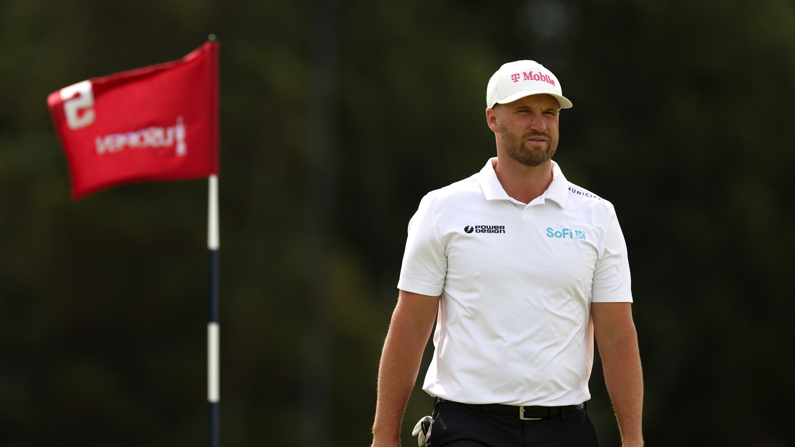 Wyndham Clark walks off the green