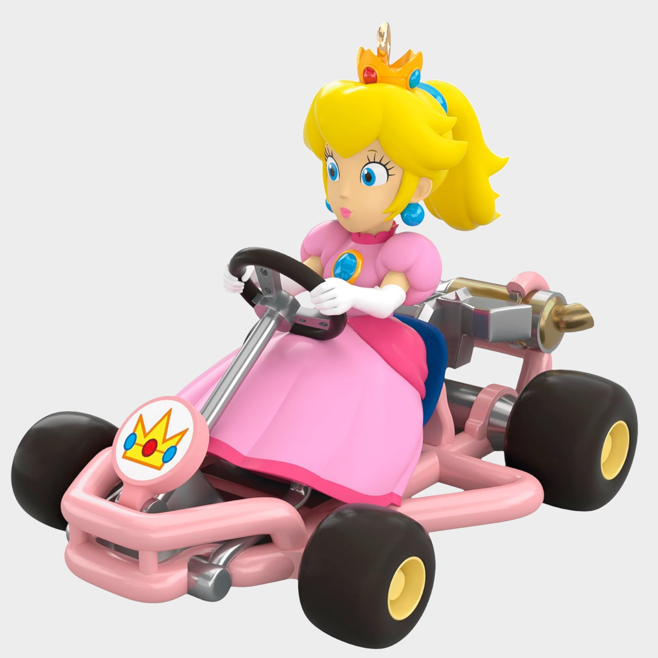 Hallmark Princess Peach ornament on a plain background