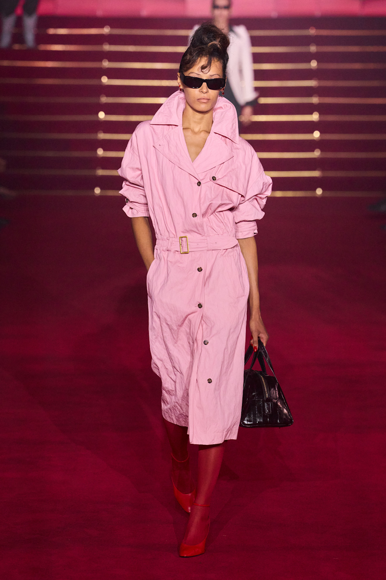 A model wore Eva Longoria's pink trench coat dress on the Willy Chavarria Spring 2026 runway