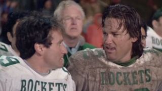 Robin Williams and Kurt Russell in football uniforms