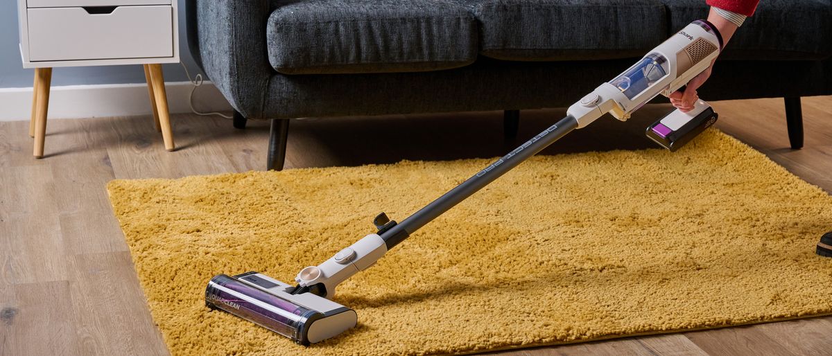 Shark Detect Pro cordless vacuum being tested in a living room