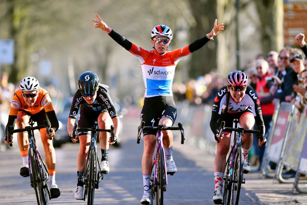 DWINGELOO NETHERLANDS MARCH 11 Christine Majerus of Luxembourg and Team SD Worx celebrates winning ahead of Alison Jackson of Canada and Team Liv Racing Xstra Floortje Mackaij of Netherlands and Team DSM Women and Thalita De Jong of Netherlands and Team Netherlands during the 15th Drentse Acht Van Westerveld 2022 Womens Elite a 1342km race from Dwingeloo to Dwingeloo UCIWWT RondevDrenthe on March 11 2022 in Dwingeloo Netherlands Photo by Luc ClaessenGetty Images