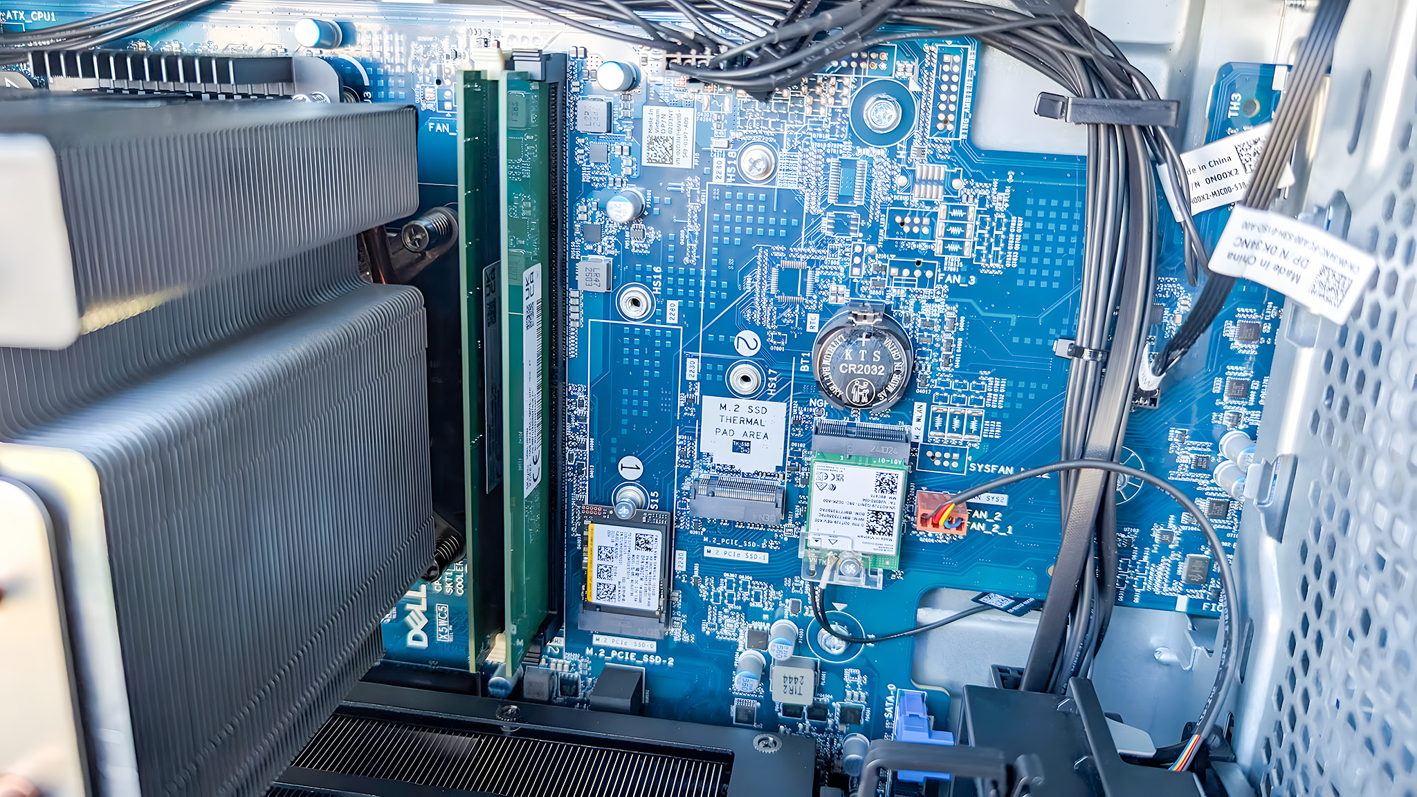 A closeup of the RAM and SSD slots inside the Dell Tower Plus EBT2250.