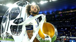 Real Madrid's Marcelo with the Champions League trophy.