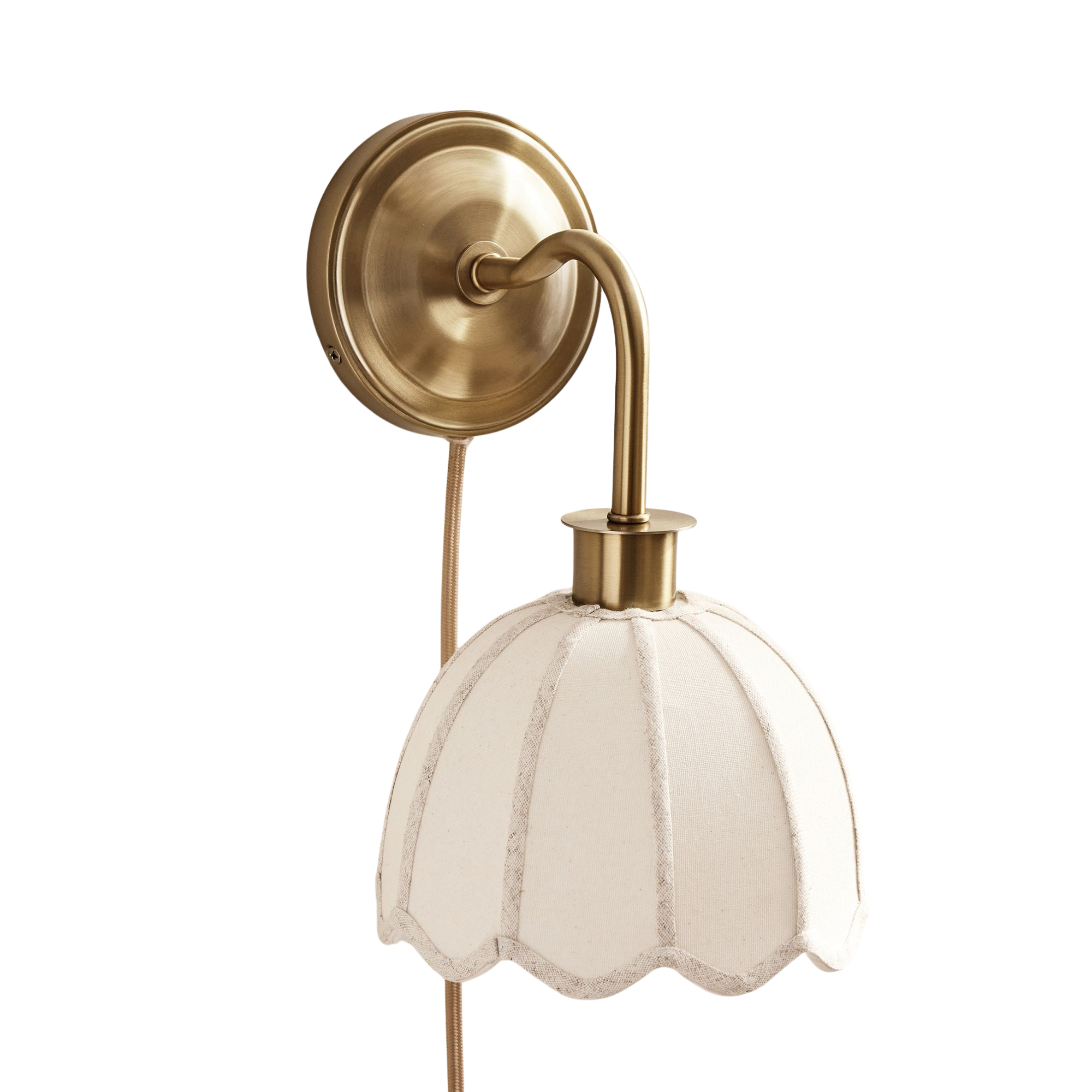 a plug in sconce with a fabric shade