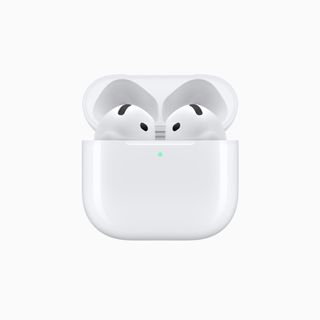 Apple AirPods 4 in their charging case.