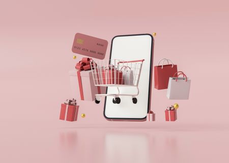 online shopping graphic with shopping card, credit card, and gift boxes