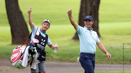 Gary Woodland (right) and his caddie, Brennan Little give a thumbs up to someone out of shot at the 2024 Zozo Championship