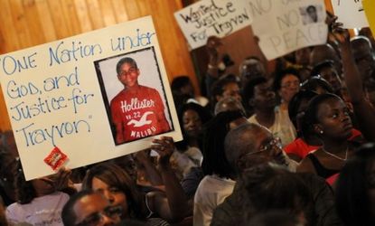 Civil rights leaders and residents of Sanford, Fla., attend a town hall meeting to discuss the death of 17-year-old Trayvon Martin: The teen was shot and killed by a self-appointed neighborho