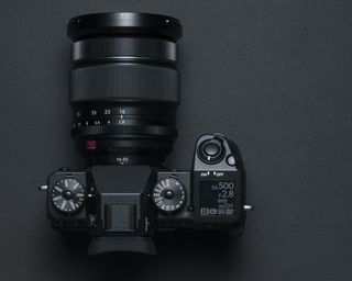 The camera's top plate follows a similar layout to the X-T2's