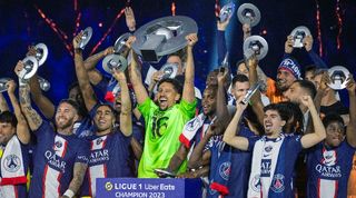Marquinhos and his PSG team-mates celebrate the Ligue 1 title at the trophy presentation in June 2023.