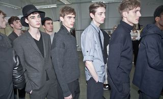 A line of models wearing smart clothing