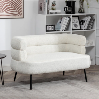 White boucle small sofa.