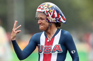 Kristin Armstrong (USA) counts up her Olympic gold medals
