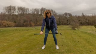 PGA pro Katie Dawkins demonstrating a good way to get into your golf swing address position