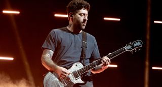 Joe Trohman of Fall Out Boy plays his Zemaitis singlecut onstage in 2023.