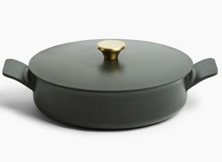 cast aluminium pan with golden lid handle