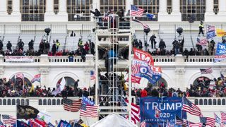 Trump supporters occupy the West Front of the Capitol and the inauguration stands on Wednesday, Jan. 6, 2021.
