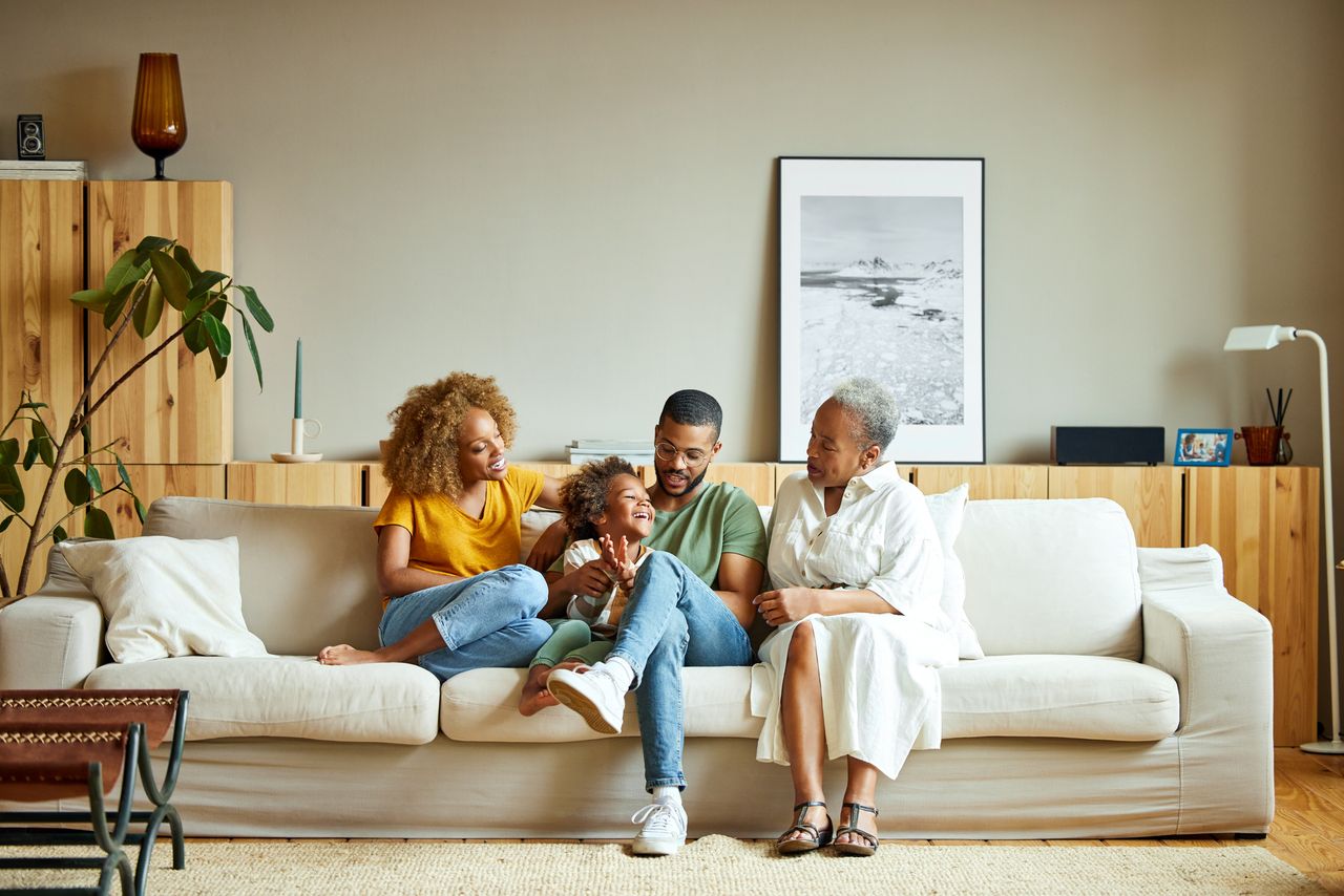 African American happy family is enjoying in living room