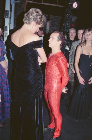 Princess Diana, Princess of Wales, attends Carnival of the Birds for the RSPB Charity, Royal Opera House, Covent Garden, London, Britain. Diana is introduced to the cast by dancer Wayne Sleep, who is dressed in the red leotard stage costume Picture taken 3rd November 1991.