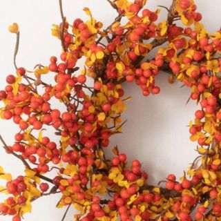 Orange wreath with berries