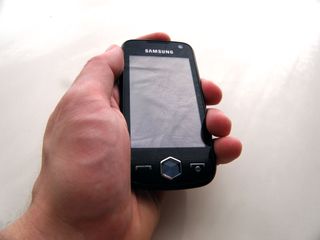 The samsung jet s8000 in the hand