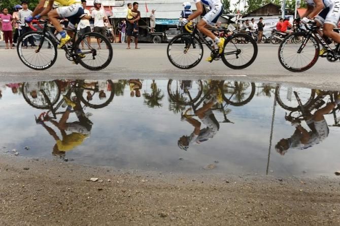 Reflection of the riders during Stage 7 Tour de Singkarak 2013.