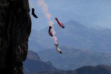 Wingsuit flyer contestants practice ahead of a competition in Zhaotong, China. 