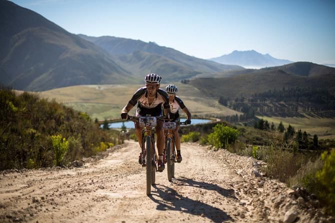 Frantisek Rabon and Christoph Sauser of Meerendal Songo Specialized push hard to make back some time