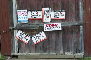 fracking protest signs