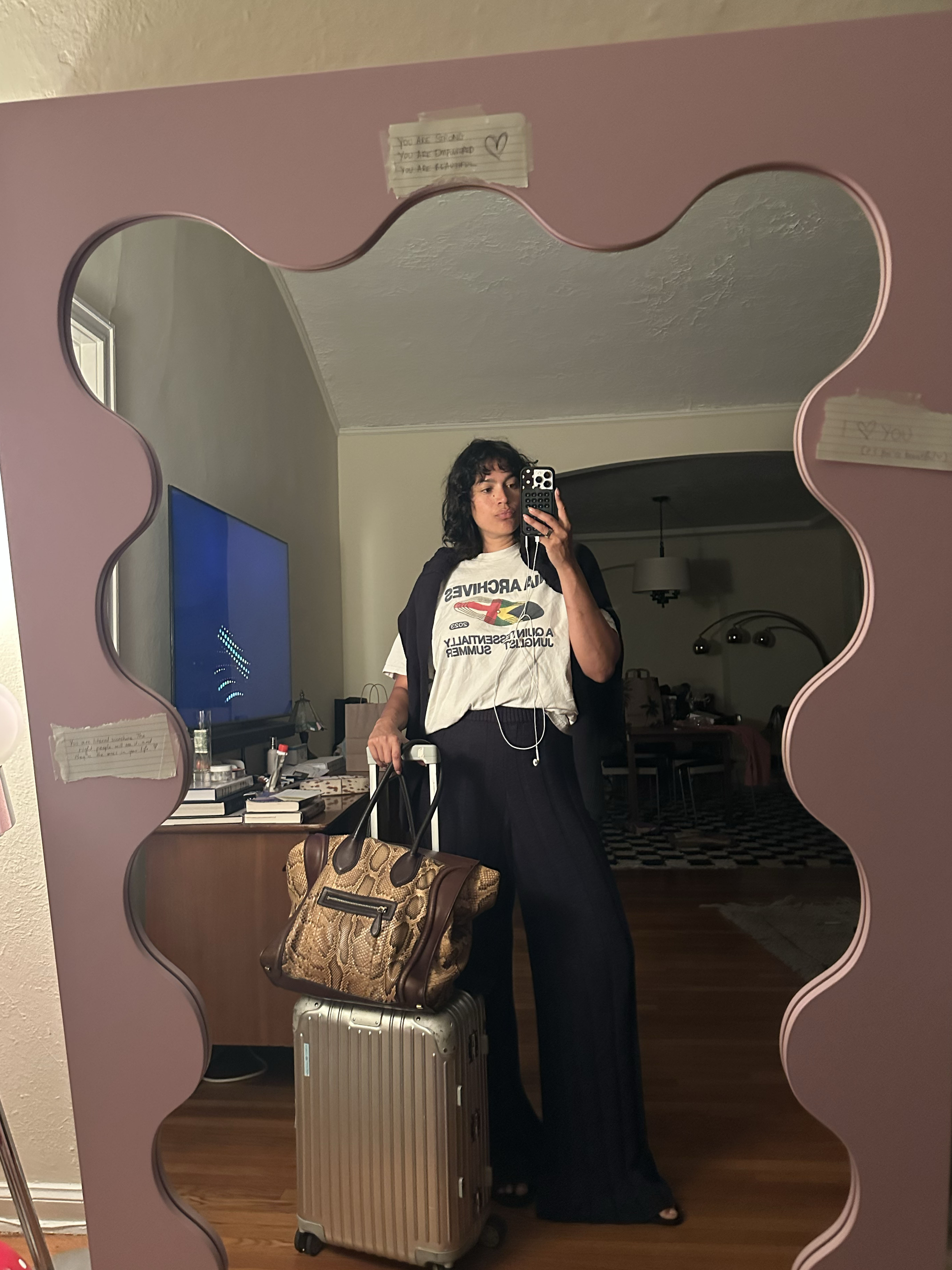 jennifer atilemile travel outfits