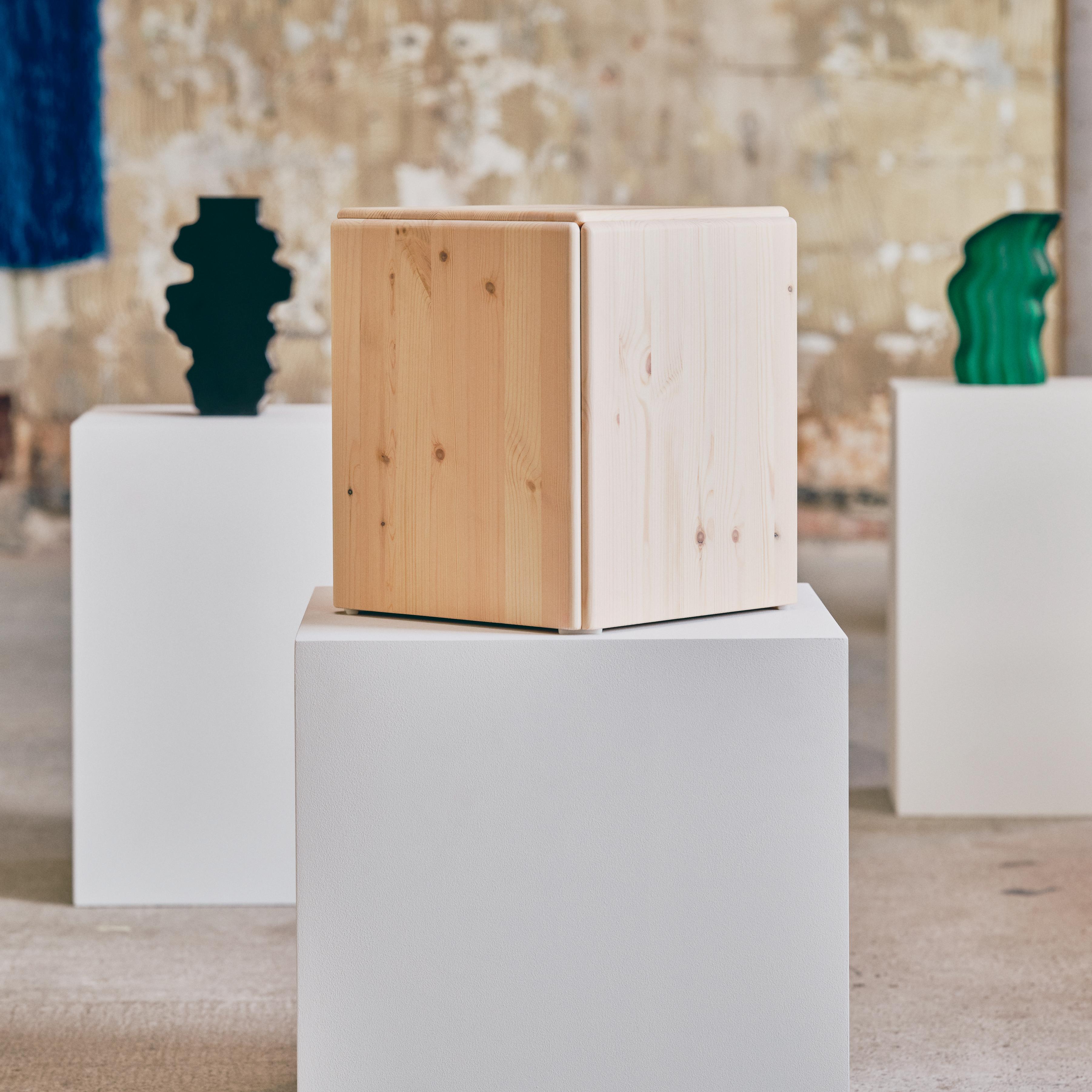 furniture and decorative objects displayed on plinths