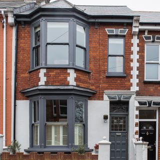 terrace house with grey front door