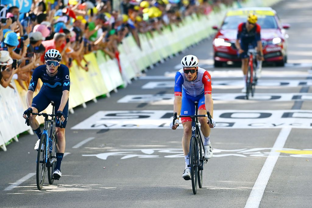 SAINTETIENNE FRANCE JULY 15 LR Matteo Jorgenson of Movistar Team and Movistar Team and Stefan Kng of Switzerland and Team Groupama FDJ cross the finish line during the 109th Tour de France 2022 Stage 13 a 1926km stage from Le Bourg dOisans to SaintEtienne 488m TDF2022 WorldTour on July 15 2022 in SaintEtienne France Photo by Tim de WaeleGetty Images
