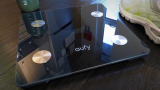 Eufy Smart Scale C1 on a living room floor