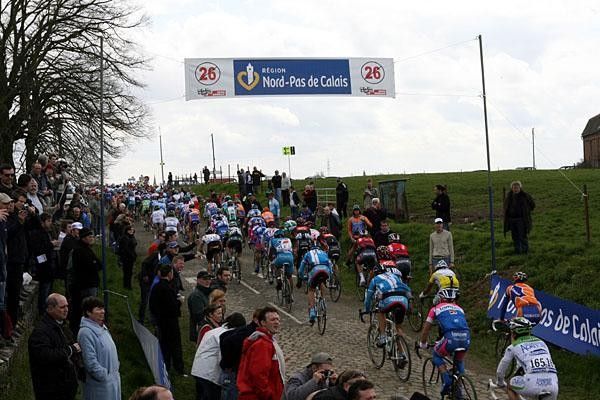 It's a relief when the riders see the number crossed out, as it means the end of the cobble section.