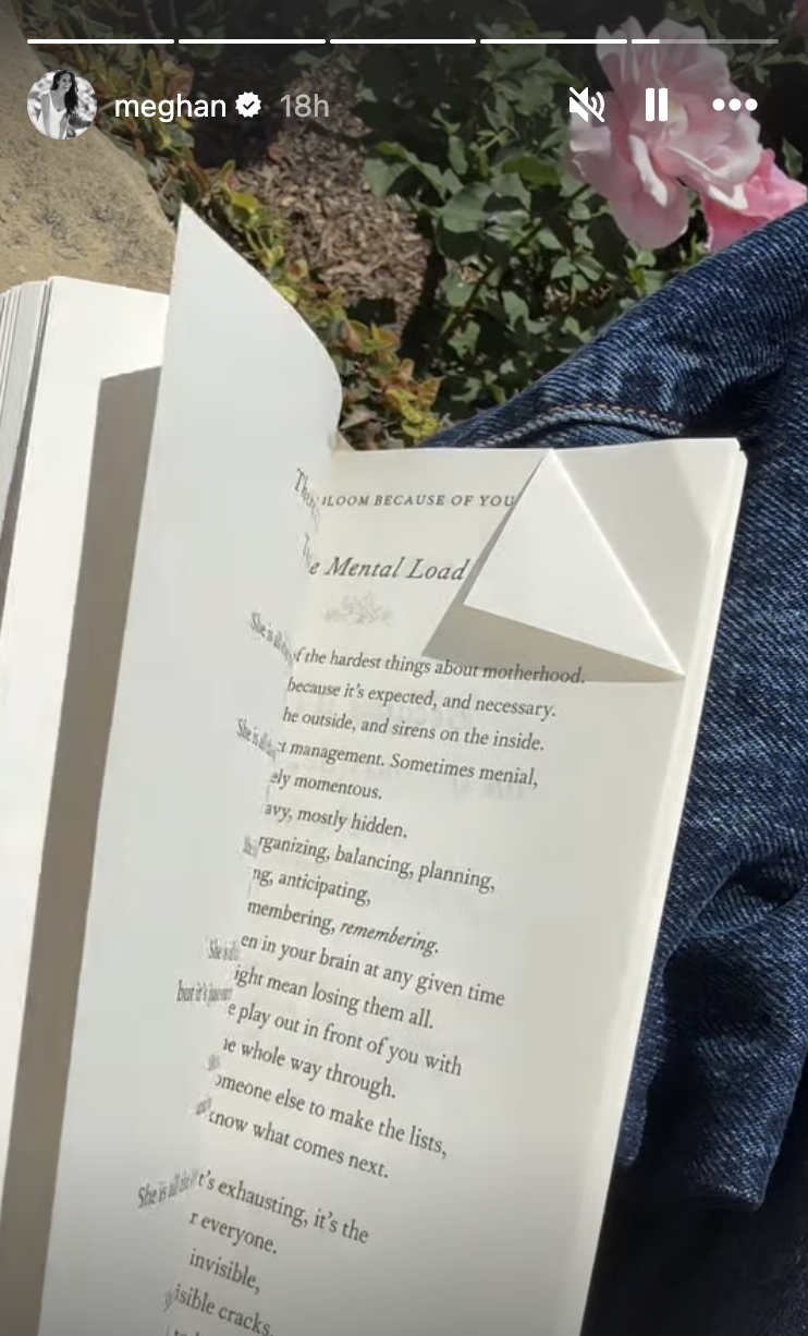 A dogeared book on Meghan Markle's lap