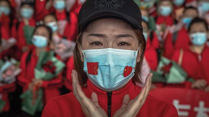 People in Wuhan, China © Shutterstock
