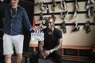 Dwight Yorke being filmed for 99.