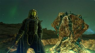 A Dune: Awakening player character standing beside Jasmium Ore. It's a yellowish glowing rock in a puddle. 
