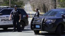 Police near the home of Jack Teixeira.